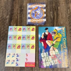 1999 Tokyo Crazy Paradise Memo Pad, Post-it stickers , and a pocket album.